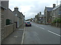 Bus stop on Main Street, Castletown (A836)