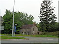 Derelict house on a roundabout