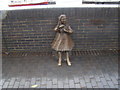 View of a girl statue on Bermondsey Wall East next to The Angel pub