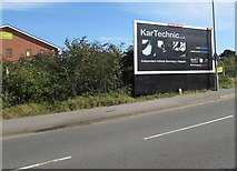 SZ1593 : Kar Techic advert in Christchurch by Jaggery