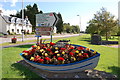 A boat filled with flowers at Corpach