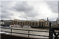 View of Butlers Wharf from the Thames Path by the Guoman Tower Hotel