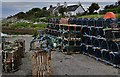 Brora Harbour: Neatly stacked lobster pots