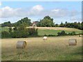 Straw bales and Hill Court, Grafton Flyford