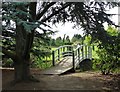 Bridge to landscaped garden at Walkers