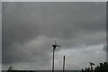 View of a small wind turbine on Dymchurch Road from the Romney, Hythe & Dymchurch Railway