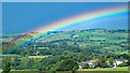 NY8355 : Rainbow over Allendale Town by Mike Quinn