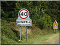 TM1292 : Bunwell Village Name sign on the B1113 The Turnpike by Geographer