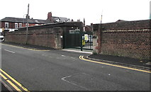SJ8989 : Army Reserve Centre perimeter wall, Stockport by Jaggery