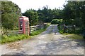 NR7675 : Telephone box and cattle grid by David Lally