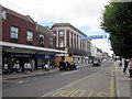 Parade Exmouth Cancer Research Shop on Left