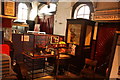 View of a display of a steam engine and a telephone box in the Walthamstow Pump House Museum