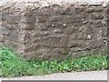 Benchmark on bridge at Wootton Courtenay