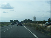 SK9133 : A1 near Gorse Lane water tower by Colin Pyle