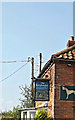 TM1389 : The Greyhound Public House sign by Geographer