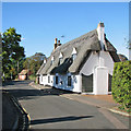 TL4762 : Milton: white cottage, blue sky by John Sutton