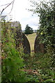 View through stile in dry stone wall beside Wood Lane