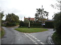 Road junction and village sign, Eastbridge