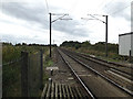 TM1689 : Railway Lines at Moulton Level Crossing by Geographer