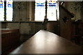 View along the top of a pew in St. Etheldreda