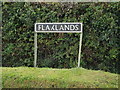 TM1093 : Flaxlands sign by Geographer
