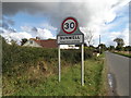 TM1094 : Bunwell Village Name sign on Mile Road by Geographer