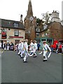 SP8699 : Morris Dancers in Uppingham Market Place by Bob Cantwell