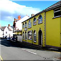 Yellow building in Neptune Road, Tywyn