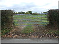 Gated farm track off Back Lane