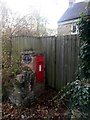 Lew: postbox № OX18 438 and a glimpse of Pillar Box Cottage