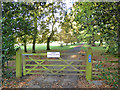 Gated road north from Over Worton