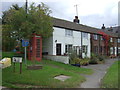 Telephone box and cottages, Foxholes