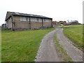 Footpath approaches barn at Garston