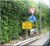 H8845 : Road directions at the Drummad junction on the A3 by Eric Jones