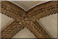 Iffley, St. Mary the Virgin Church: Chancel roof boss, dragon framed by beasts and fir cones 3