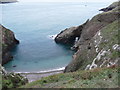 SM7509 : Cove with rock arch, Marloes by Humphrey Bolton