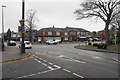 Mini-roundabout and shops on Worsley Road