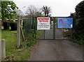 Broadway Youth Club banner and Aria Dance Company banner on a Broadway gate