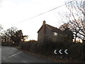 Langhurst Road at the junction of Burnt House Lane