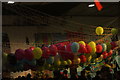 View of balloons on a hammock in the Portobello Road Winter Festival