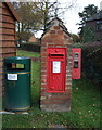 George V postbox and stamp machine on Main Street, Withybrook