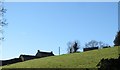 Farmhouse and out-buildings on a drumlin above the Clonallon Road