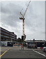 Yellow crane behind Wood Street, Cardiff