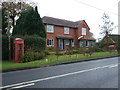 House and telephone box on Wrexham Road (A534), Faddiley