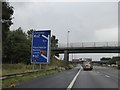 SJ6292 : Sign and bridges for J21A of the M6 southbound lane by David Smith