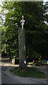 Modern wood sculpture to Carlos Trower (tightrope walker) by Rudyard Reservoir, Staffs