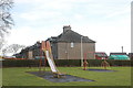 NJ8007 : Playground and council houses, Kirkton of Skene by Bill Harrison