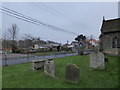 Looking from Tattingstone Churchyard towards the village hall