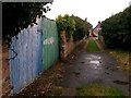 SZ1392 : West Southbourne: blue and green gates on footpath H14 by Chris Downer