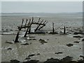 SU7601 : Thorney Island - Wrecked jetty with former runway lights by Rob Farrow